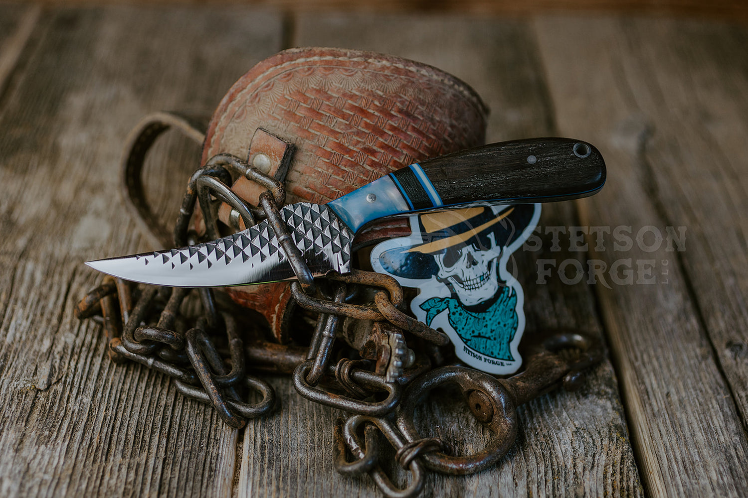 Stetson forge Coyote caper style knife with farrier rasp blade and segmented handle